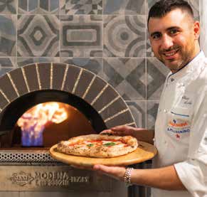 Certified technician-supported kitchen running a MAM pizza oven