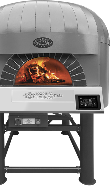 MAM rotating pizza oven with wood fire burning inside refractory stone chamber