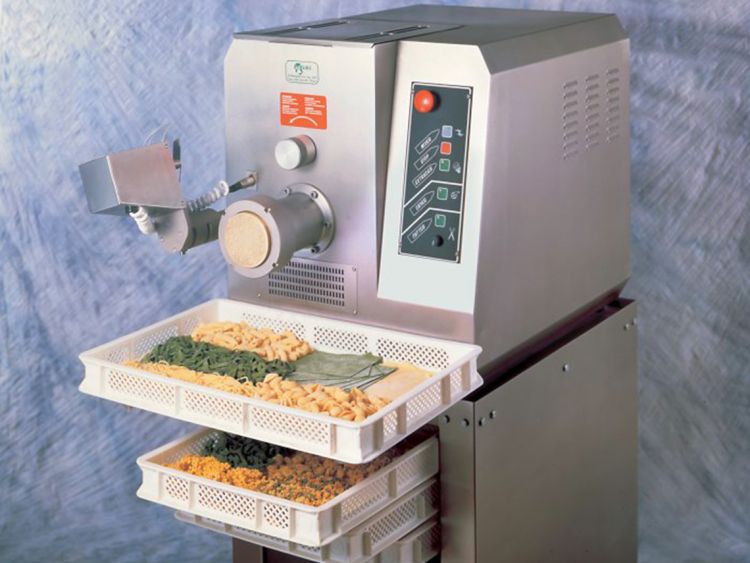 Italgi P35A pasta extruder in production with pasta dies and drying fan